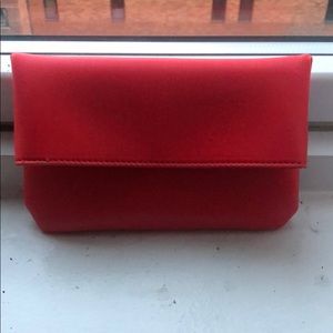 Red leather clutch